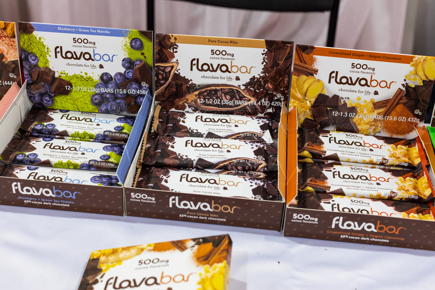 Open boxes of Flavabar in blueberry, mocha and other flavors.