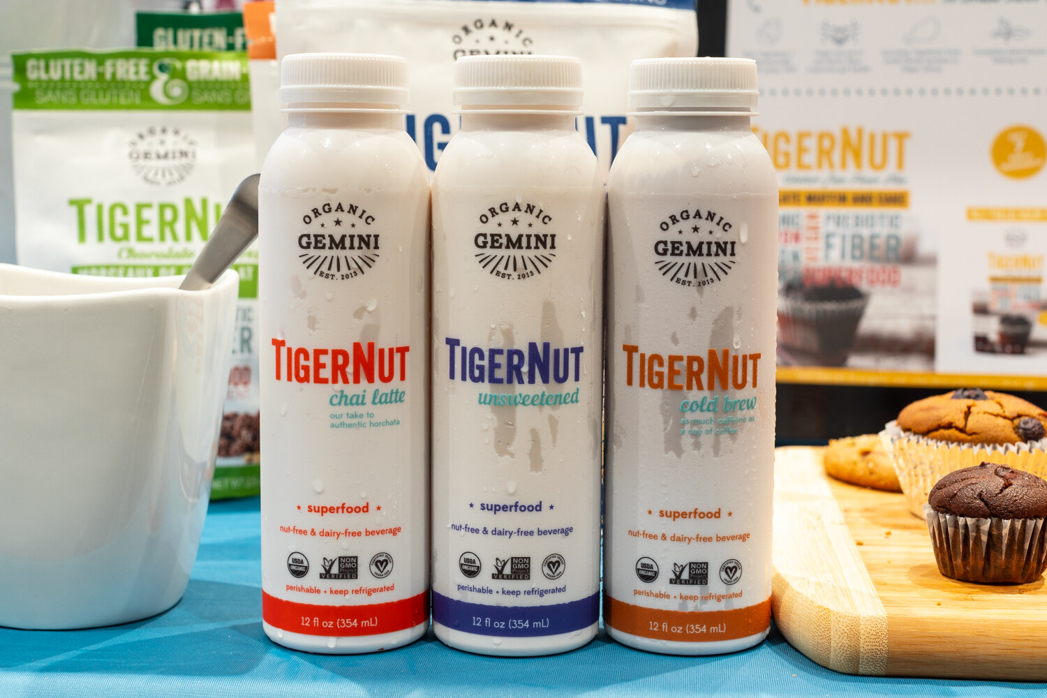 Three bottles of TigerNut chai latte, unsweetened and cold brew.