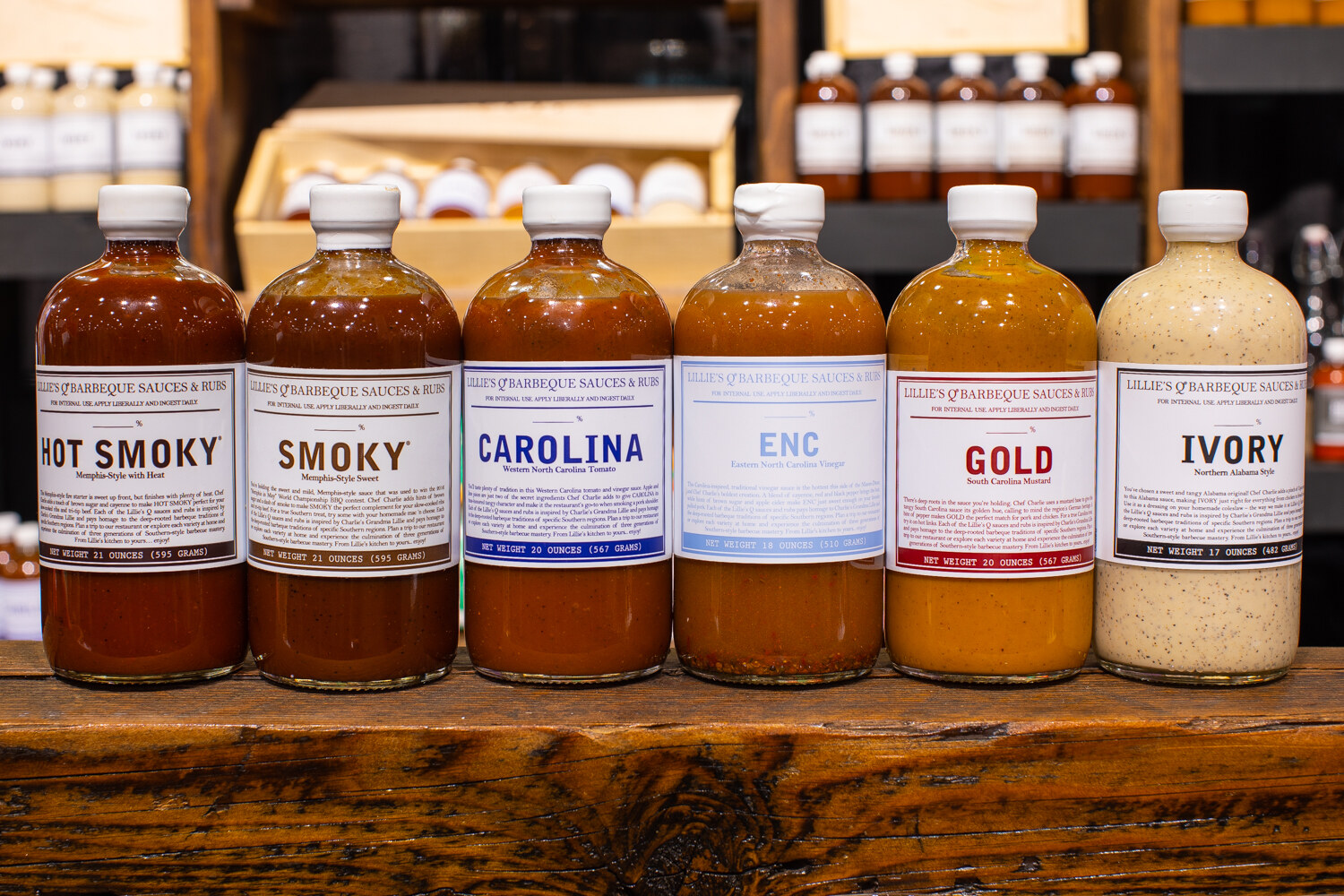 Six bottles labeled Hot Smoky, Smoky, Carolina, Gold and Ivory.