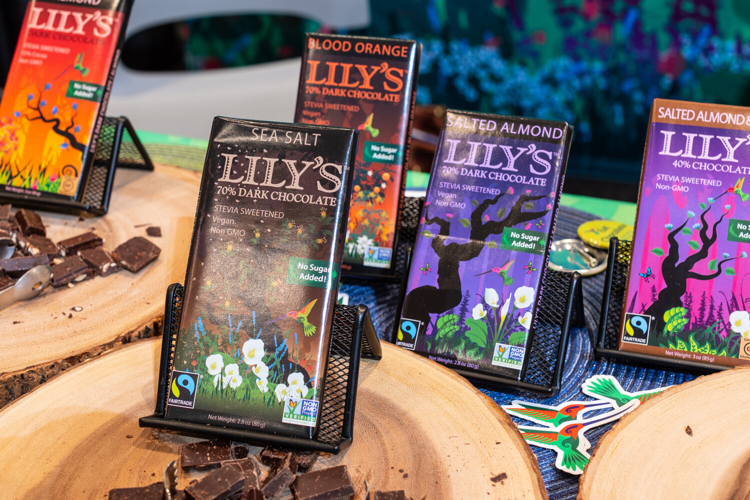 Bars of Lily's in sea salt, almond and blood orange.