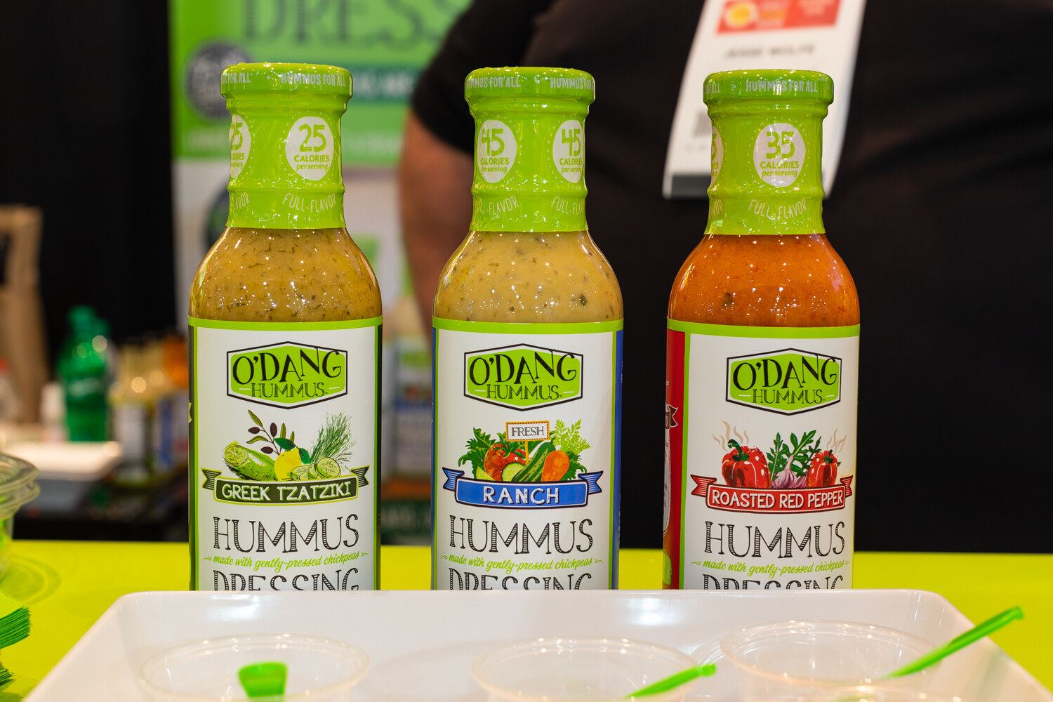 Three bottles in Greek Tzatziki, Ranch and Roasted Red Pepper.