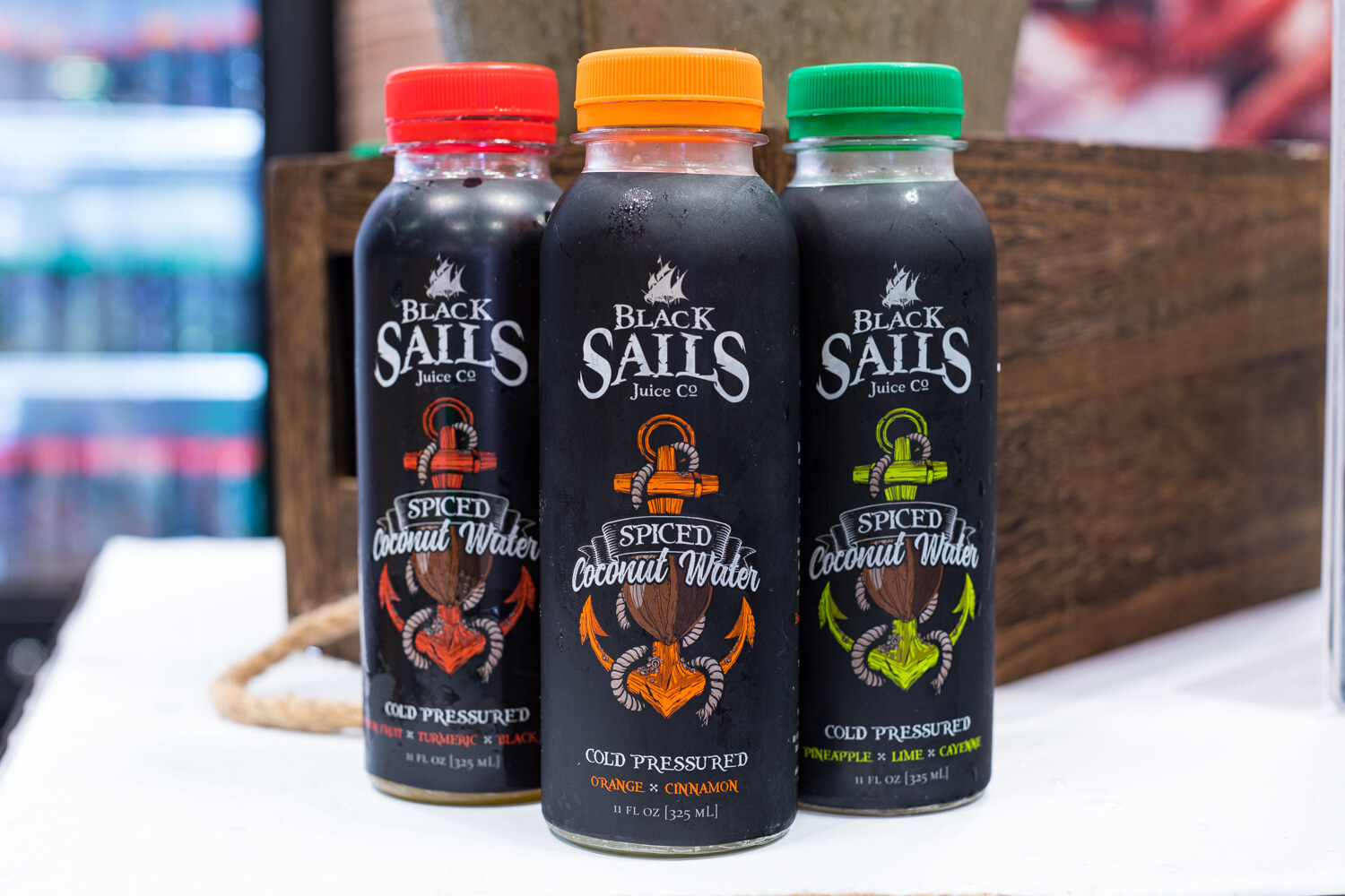 Photo of bottles of Black Sails spiced coconut water.