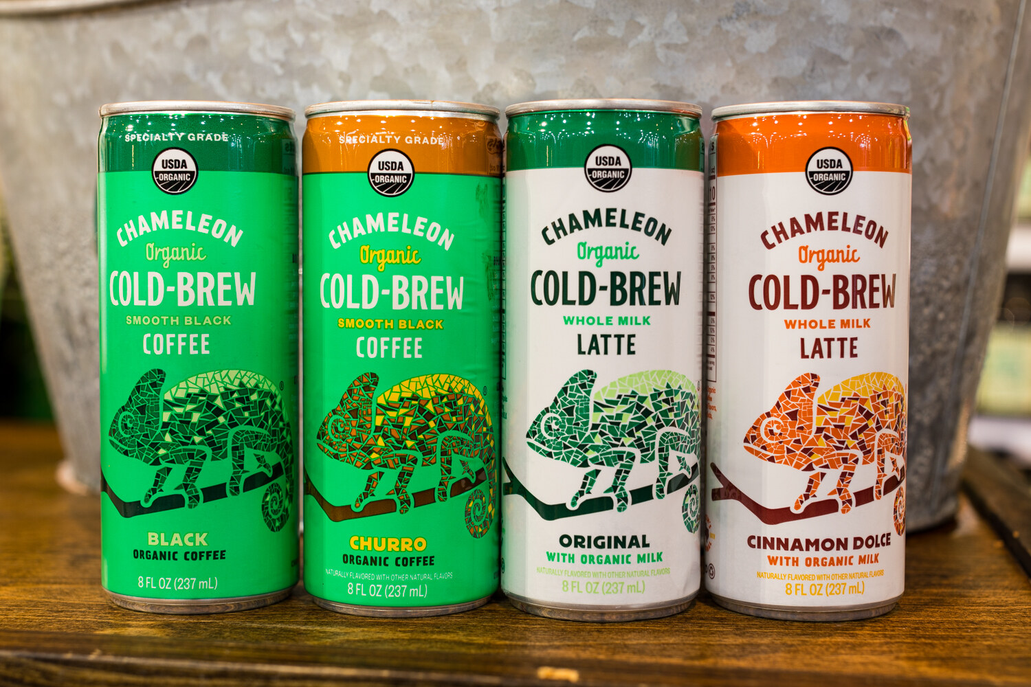 Photo of four cans of Chameleon Cold-Brew coffee and latte.