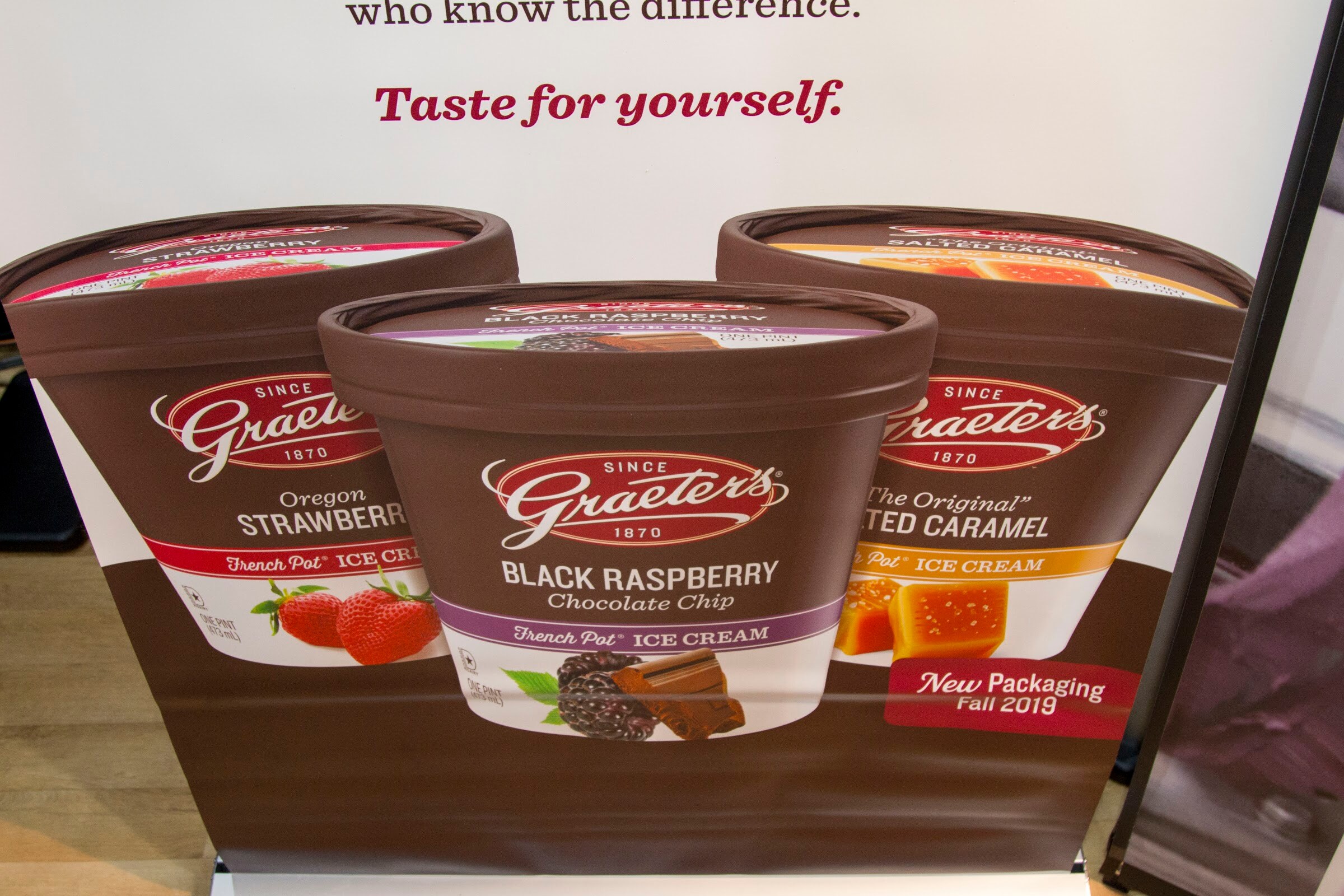 Photo of pints of Graeter's ice cream in black raspberry chocolate chip and other flavors.