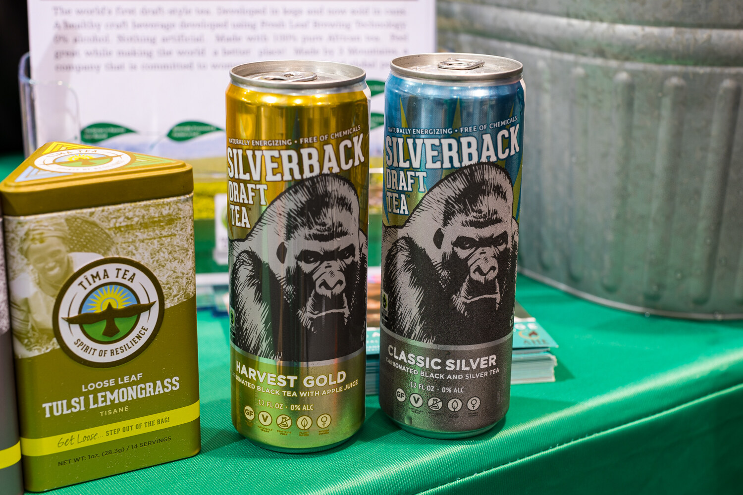 Photo of Silverback Draft Tea cans next to a loose-leaf tea tin.