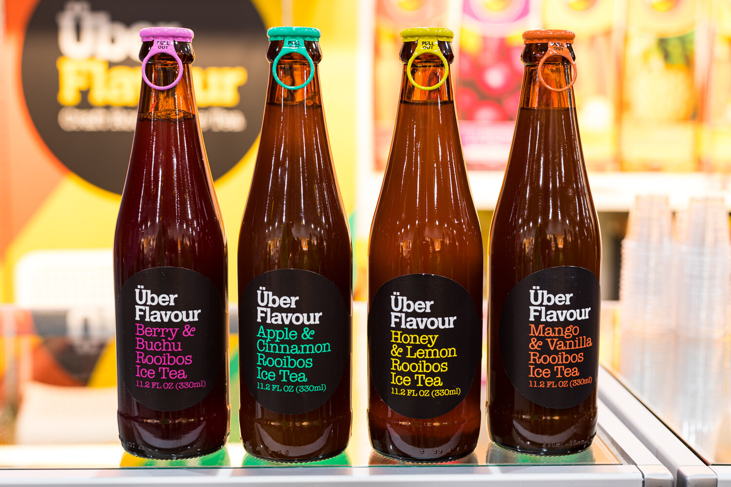 Photo of four bottles of Uber Flavour rooibos iced tea.
