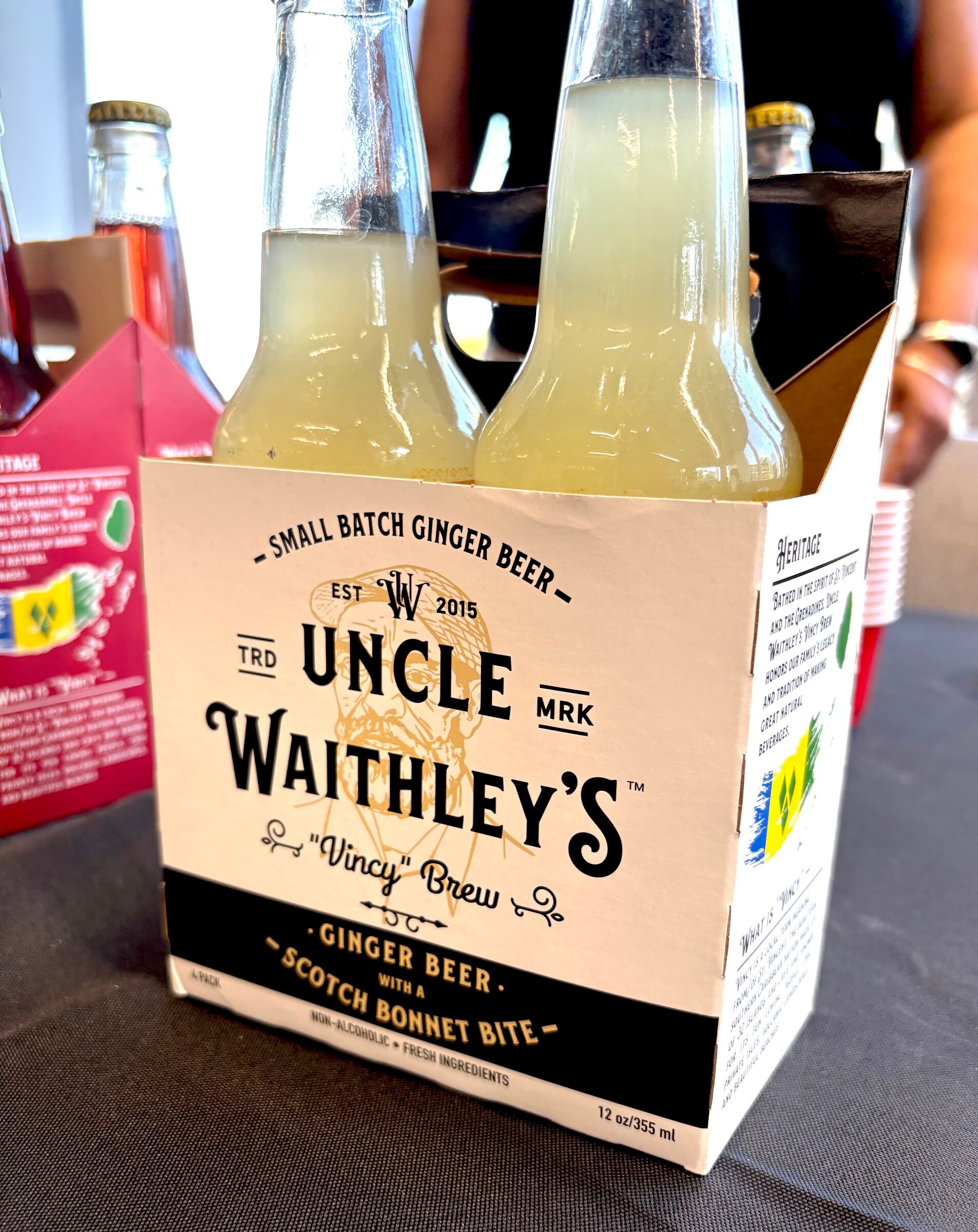 Four-pack of Uncle Waithley’s Vincy Brew ginger beer on a table.